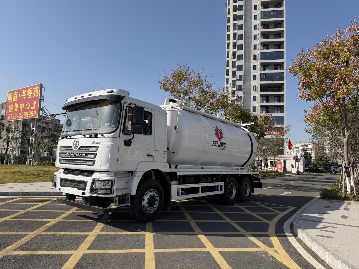 White sewage suction vacuum truck side view